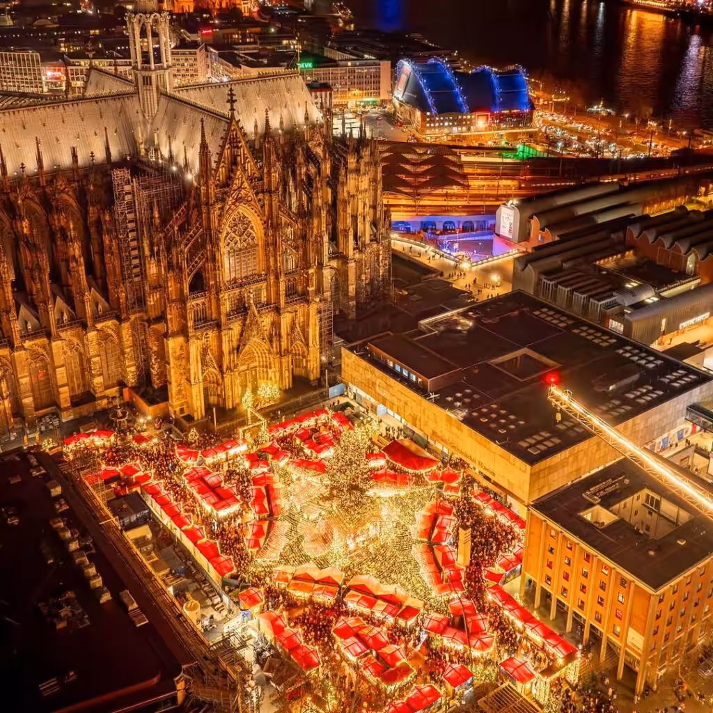 Christmas market stalls beside Cologne Cathedral
